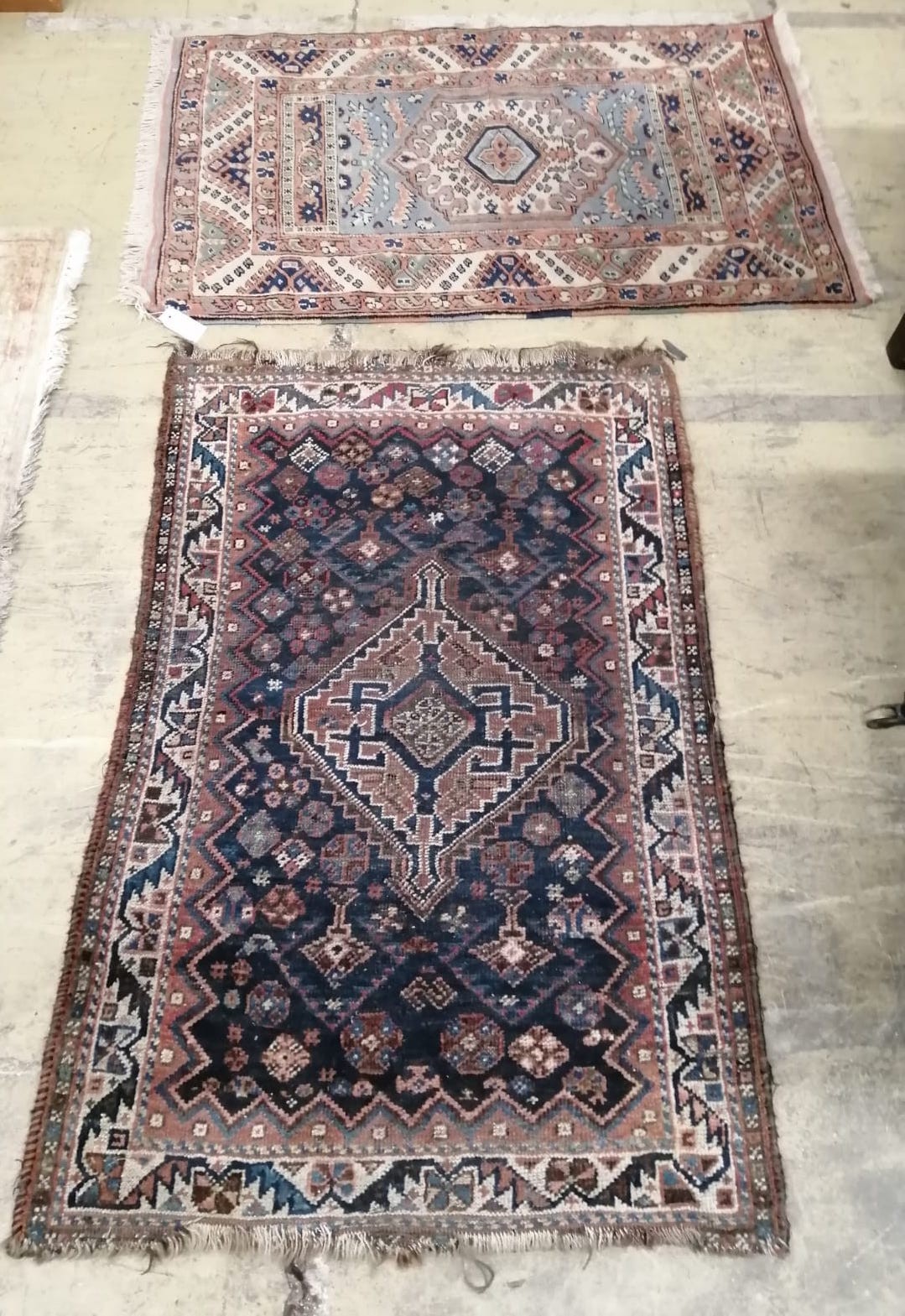 Two Caucasian and Shiraz blue ground rugs, larger 120 x 80cm